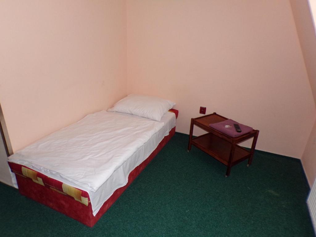 Postel nebo postele na pokoji v ubytování Motel Oseček