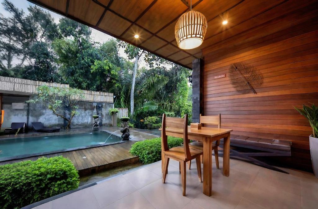 Bazén v ubytování Tattva Ubud Retreat & Wellness nebo v jeho okolí