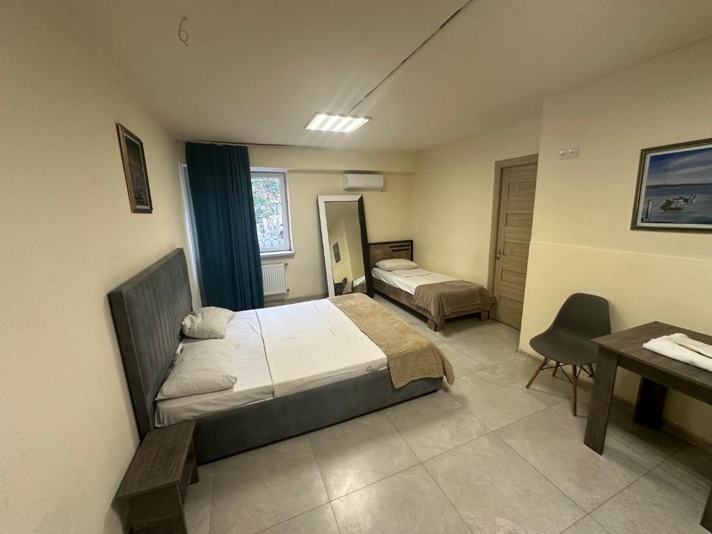 Postel nebo postele na pokoji v ubytování Best Hostel