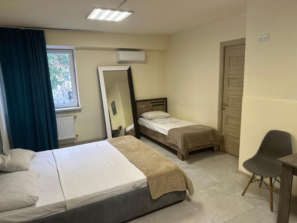 Postel nebo postele na pokoji v ubytování Best Hostel