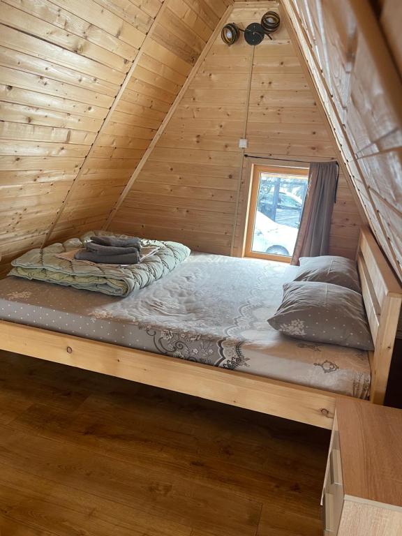 Postel nebo postele na pokoji v ubytování Khatky Na Penkakh