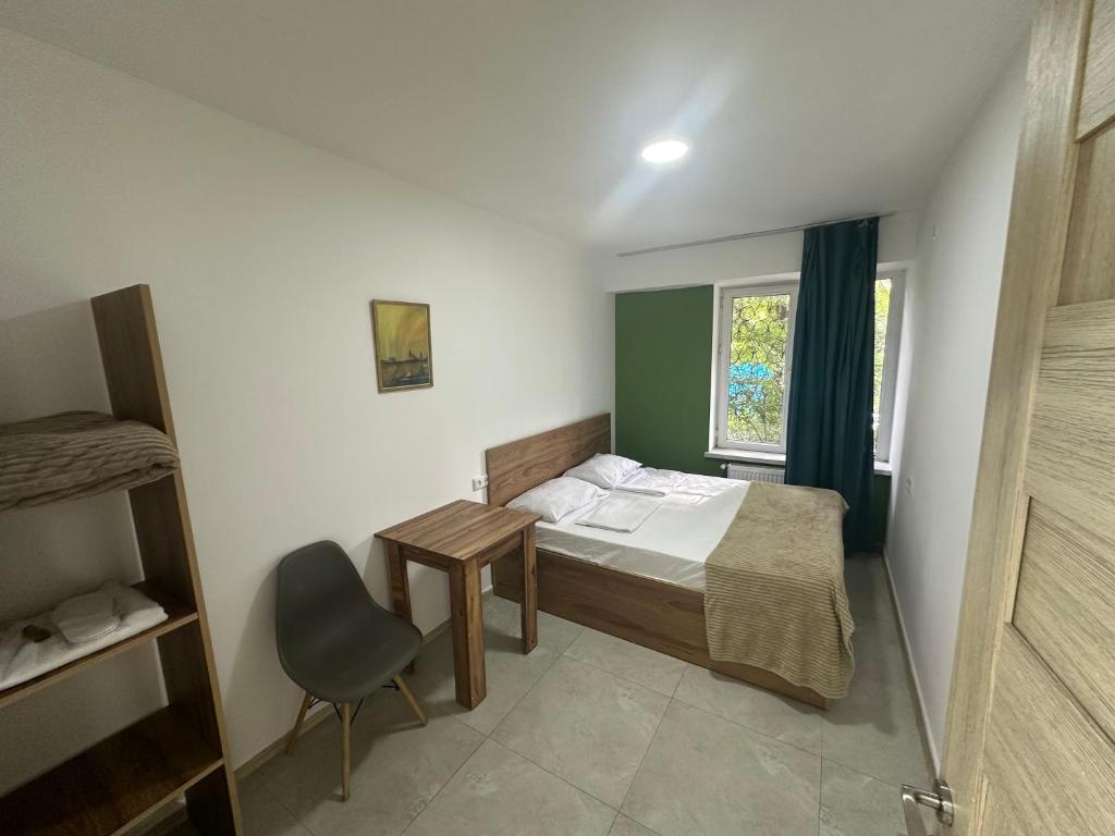 Postel nebo postele na pokoji v ubytování Best Hostel