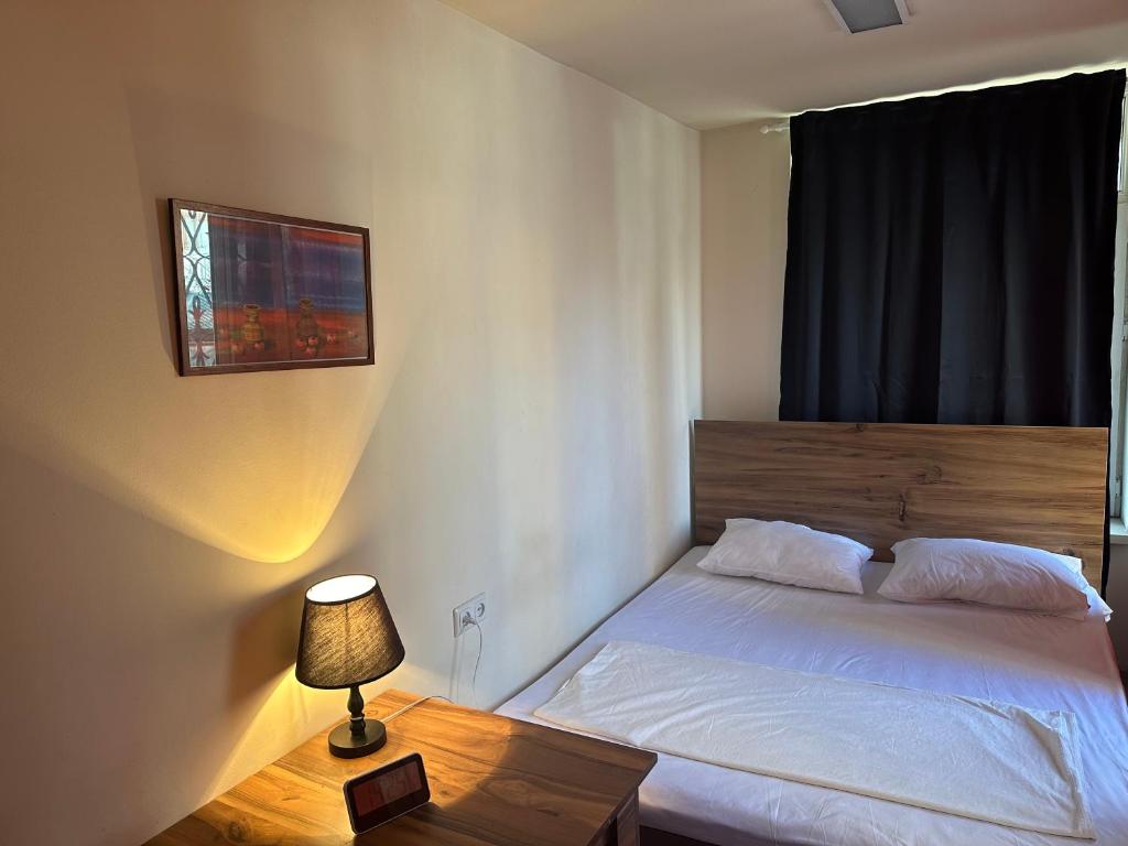 Postel nebo postele na pokoji v ubytování Best Hostel
