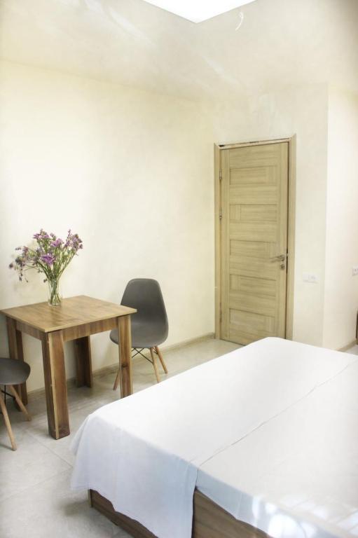 Postel nebo postele na pokoji v ubytování Best Hostel