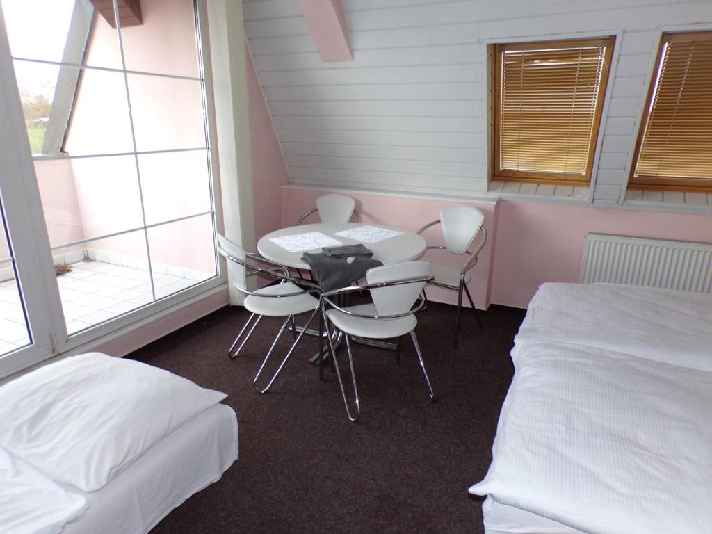 Postel nebo postele na pokoji v ubytování Motel Oseček
