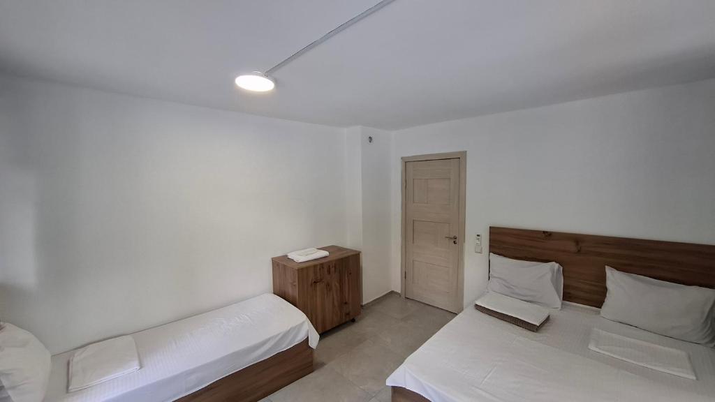Postel nebo postele na pokoji v ubytování Best Hostel