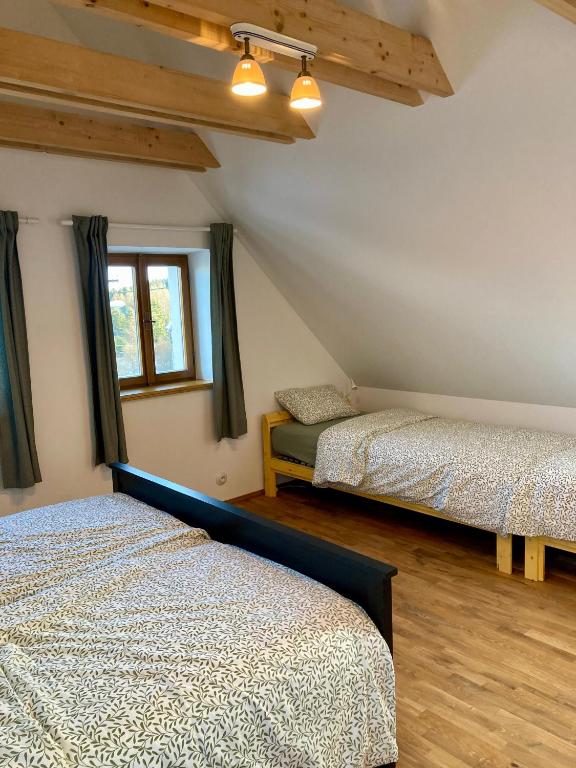 Postel nebo postele na pokoji v ubytování Chalupa Mera