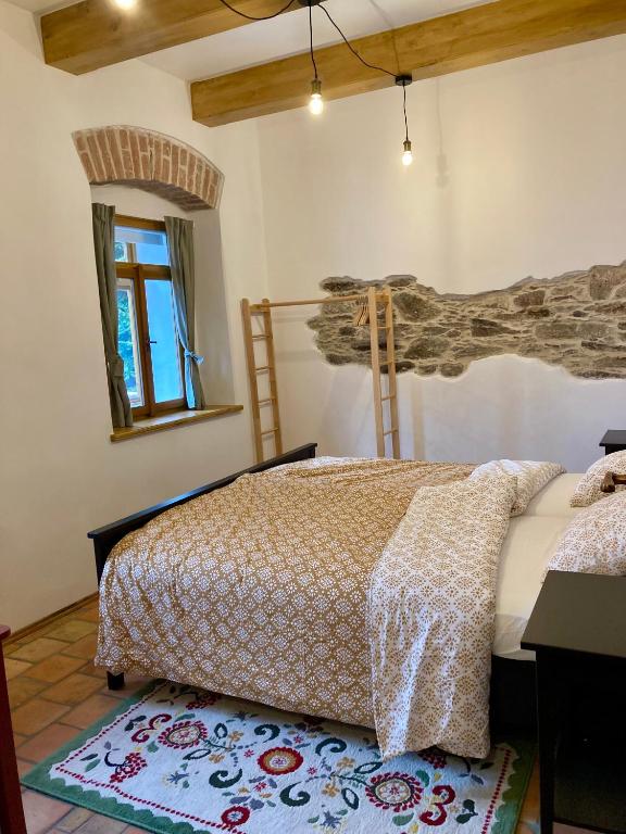 Postel nebo postele na pokoji v ubytování Chalupa Mera