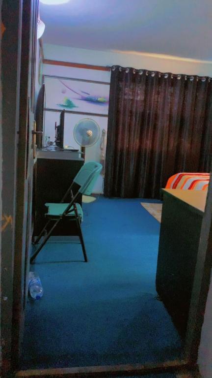 Posezení v ubytování Maleeks Apartment Ikeja "Shared 2Bedroom Apt, individual private rooms and baths"