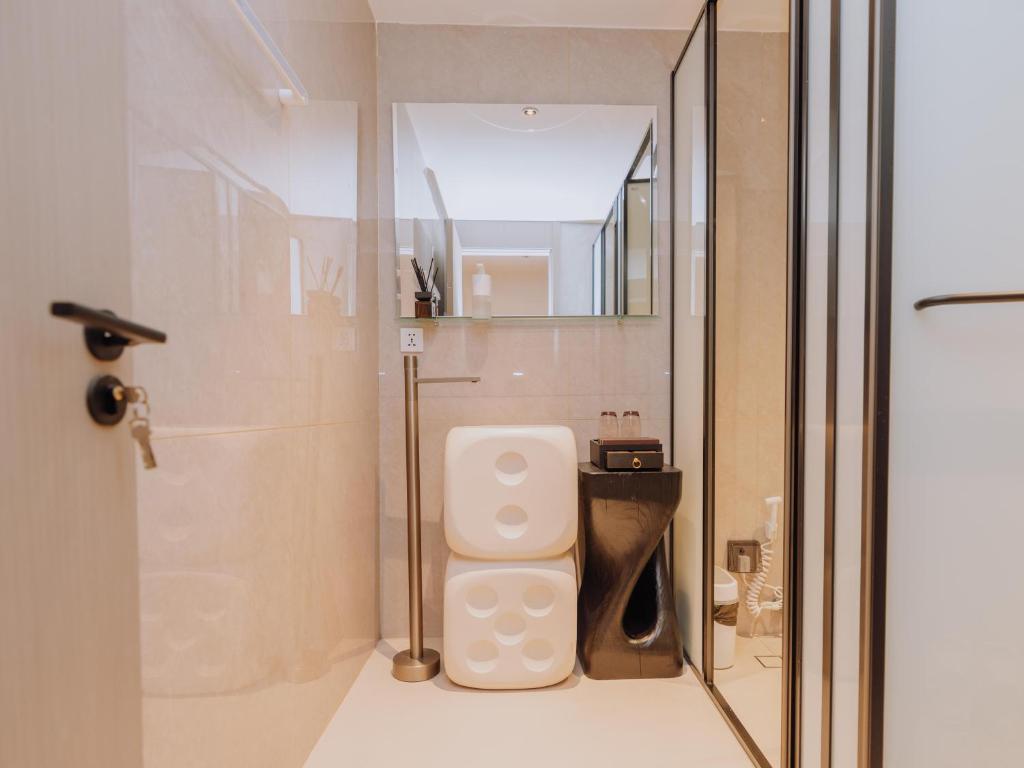 Koupelna v ubytování YUSU Hotel 羽宿酒店