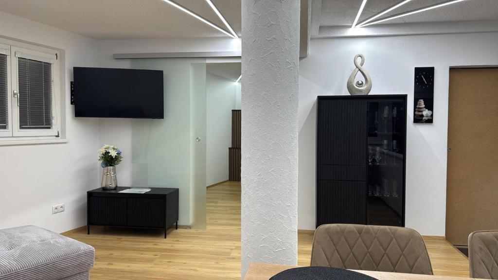TV a/nebo společenská místnost v ubytování Ferienwohnung Wanderlust
