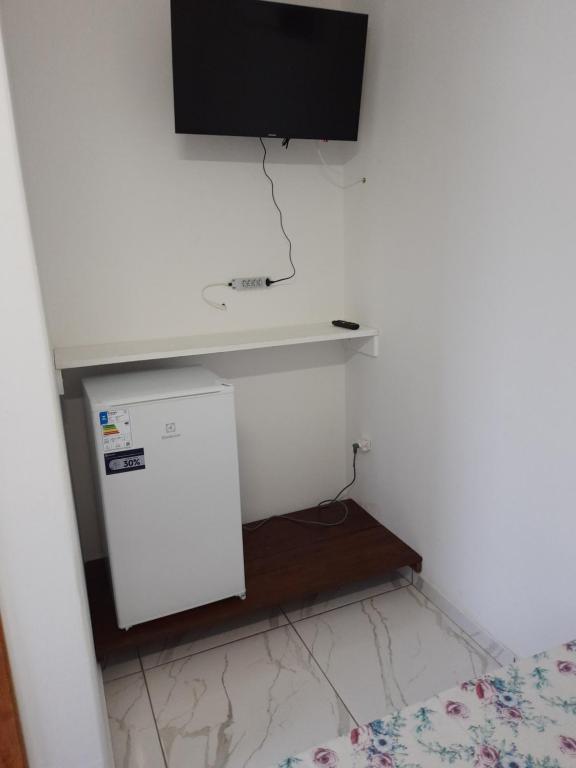 TV a/nebo společenská místnost v ubytování Hotel Pousada Guaratuba