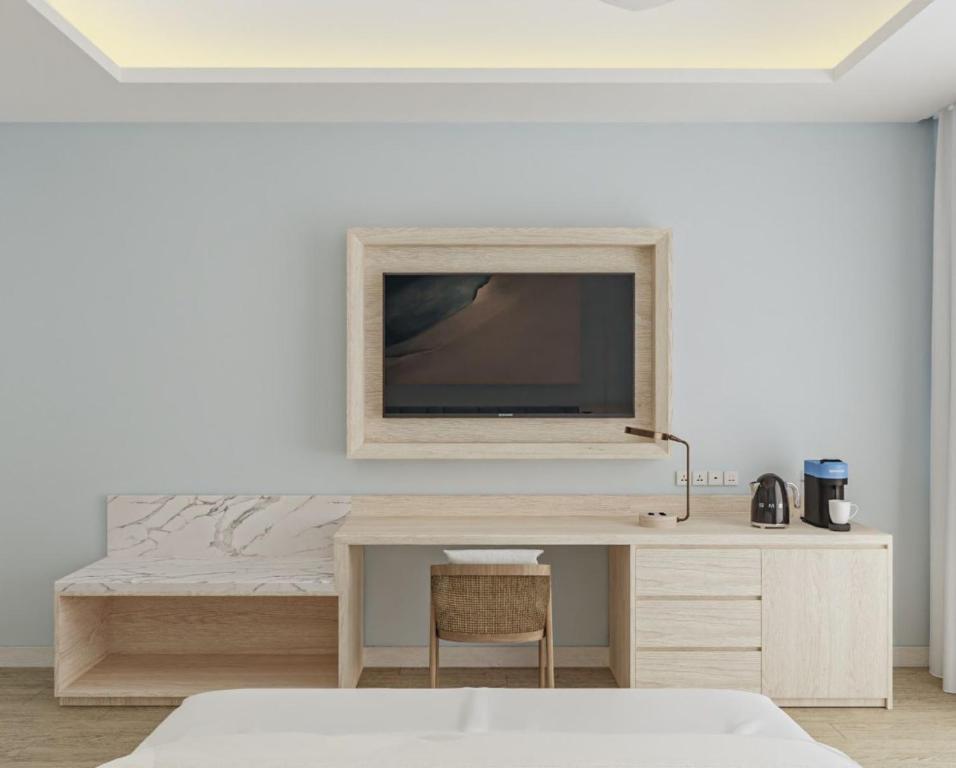 TV a/nebo společenská místnost v ubytování Eriyadu Island Resort