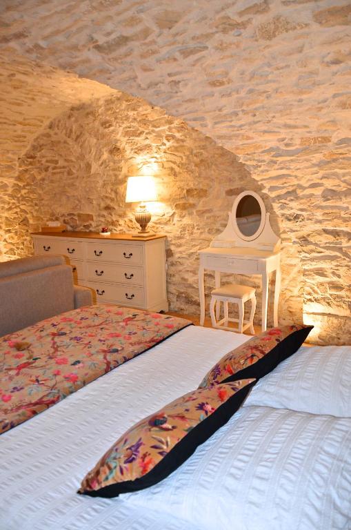 Postel nebo postele na pokoji v ubytování LOCUS AMOENUS