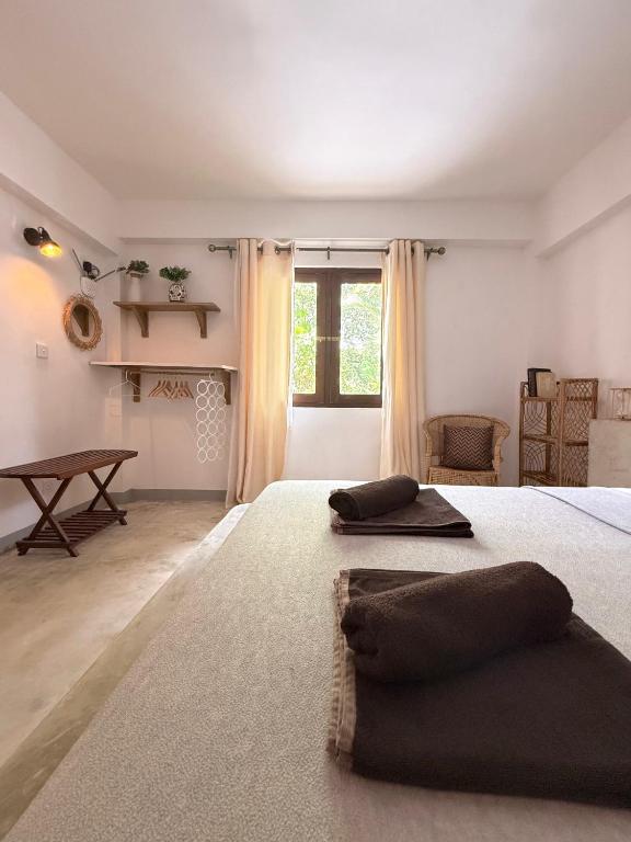 Postel nebo postele na pokoji v ubytování Sri Lanka Surf Villa Domus Graziella