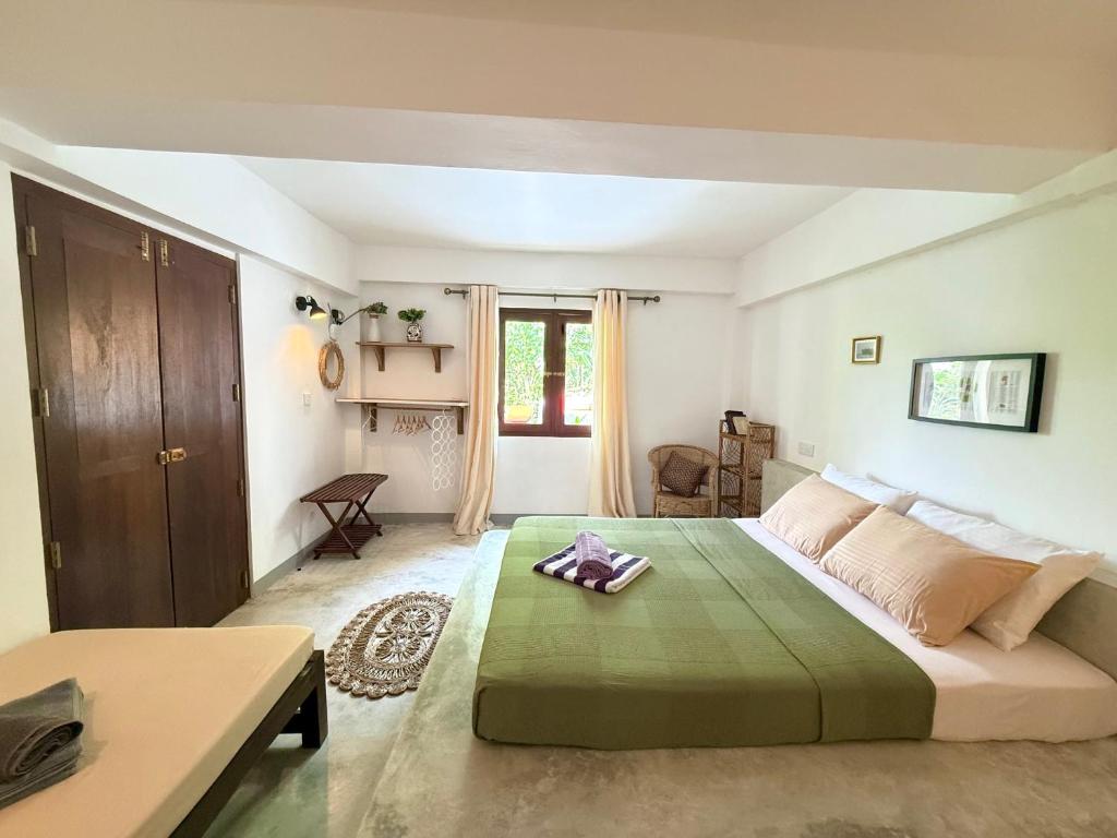 Postel nebo postele na pokoji v ubytování Sri Lanka Surf Villa Domus Graziella