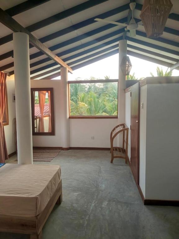 Postel nebo postele na pokoji v ubytování Sri Lanka Surf Villa Domus Graziella