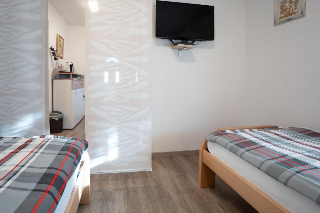 Voodi või voodid majutusasutuse Apartma Maka toas