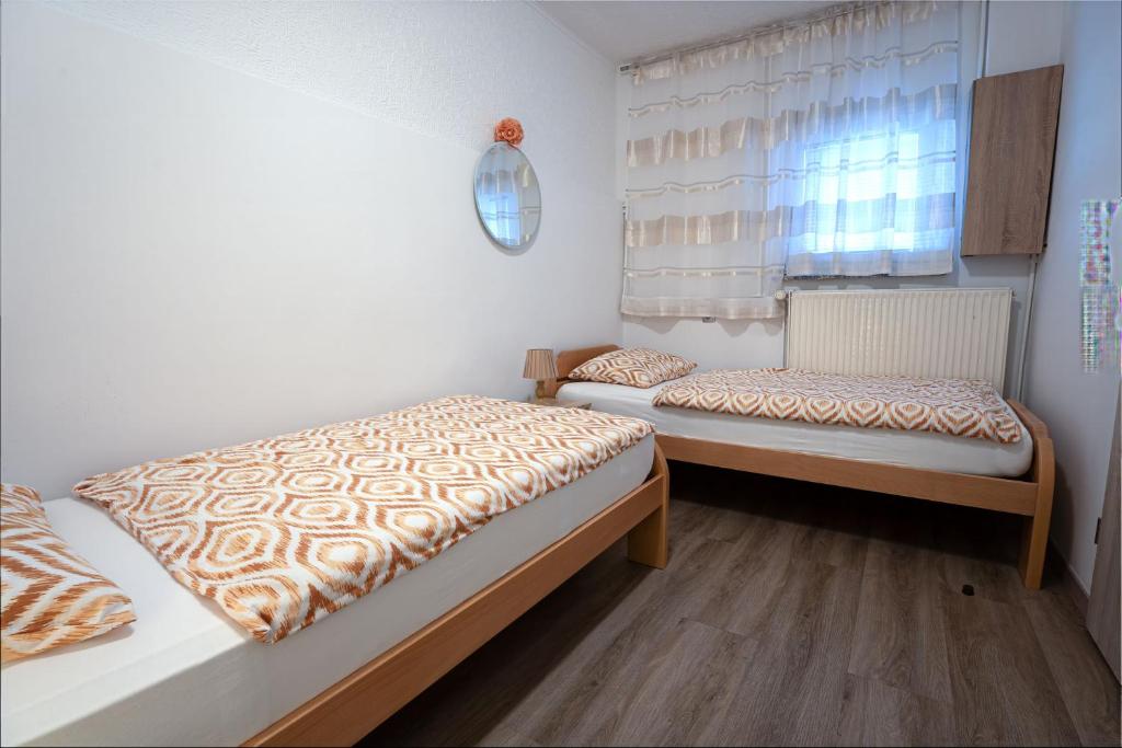 Voodi või voodid majutusasutuse Apartma Maka toas