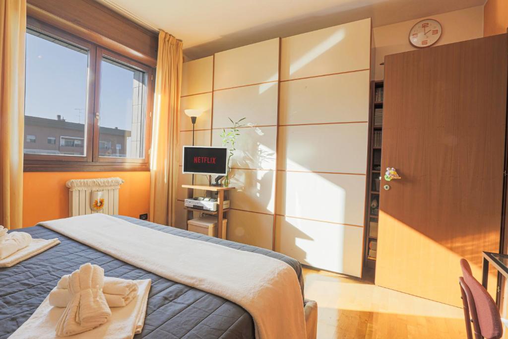 Postel nebo postele na pokoji v ubytování Camera Matrimoniale Sud Milano, Bagno Privato