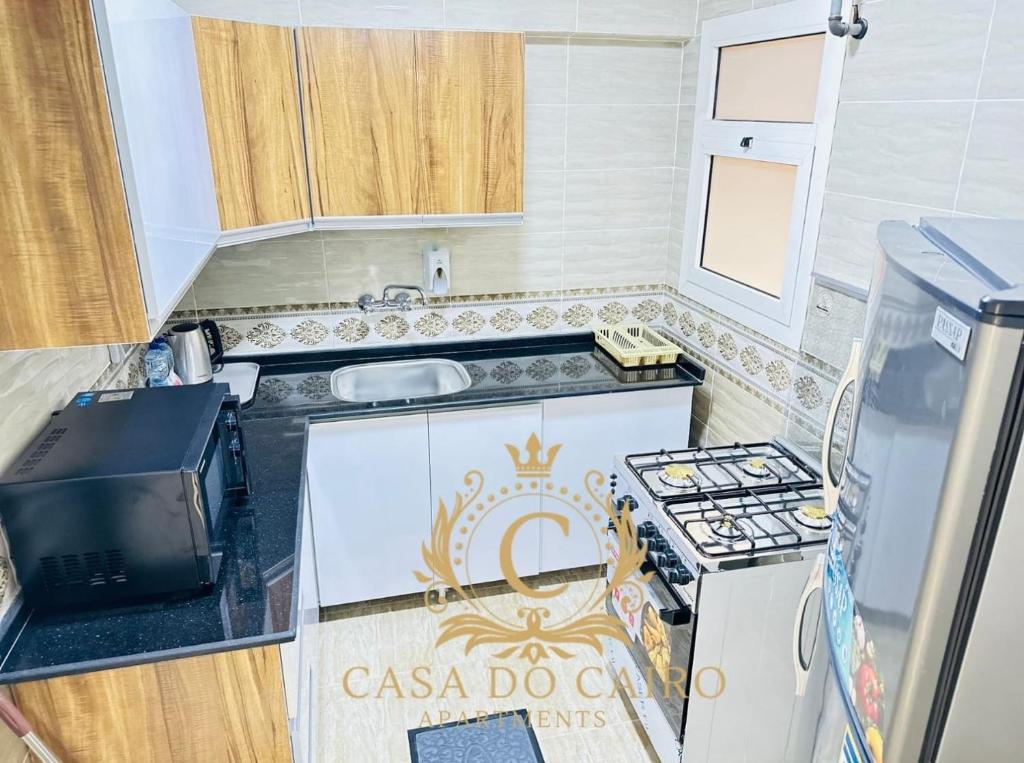 Kuchyň nebo kuchyňský kout v ubytování Casa Do Cairo - Rehab City