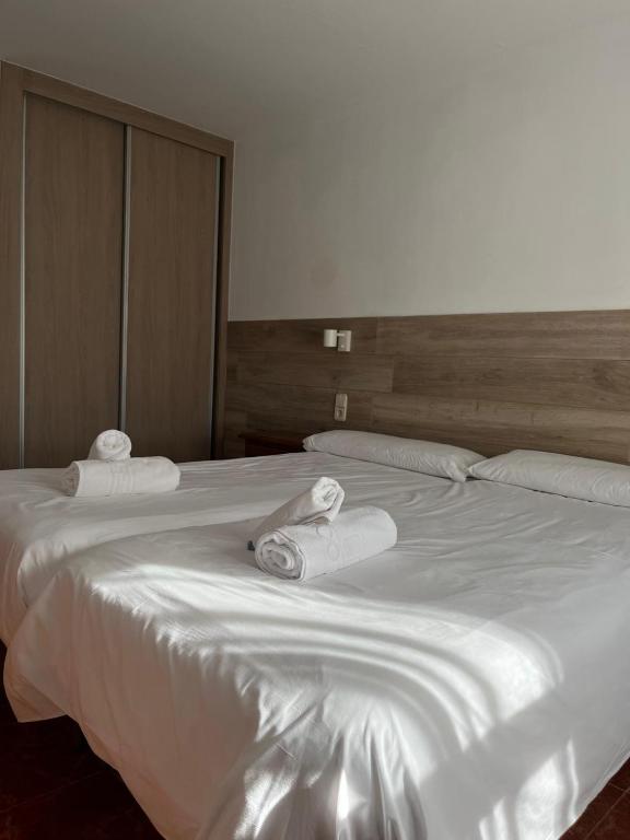 Postel nebo postele na pokoji v ubytování Hotel El Cobertizo