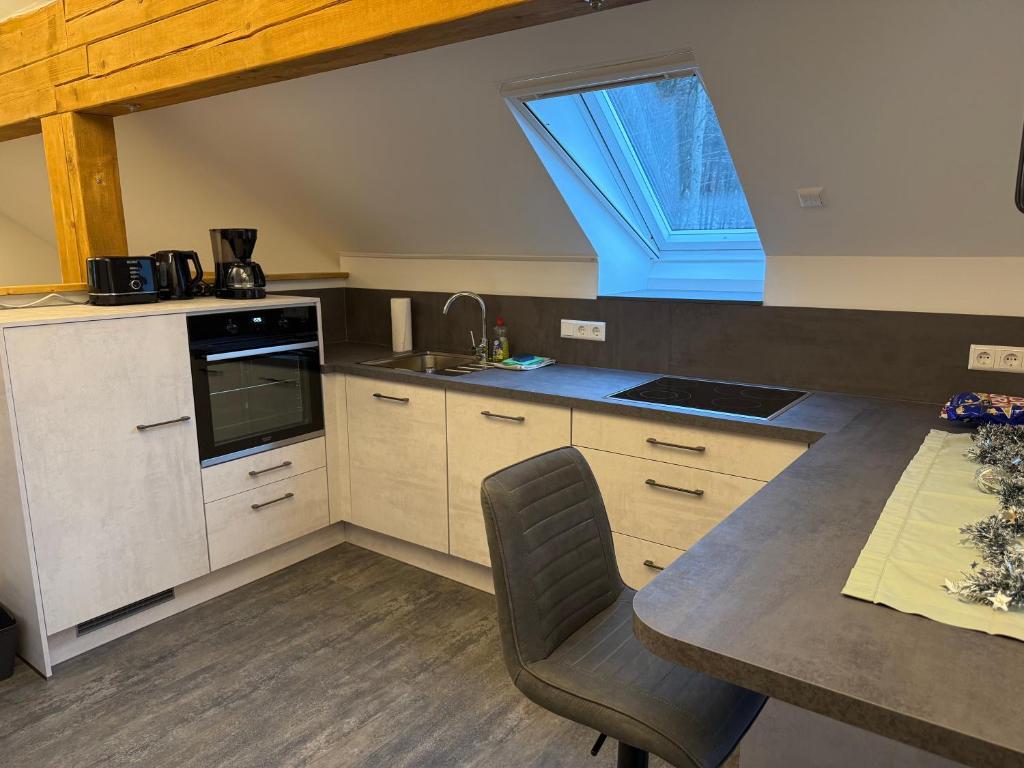 Kuchyň nebo kuchyňský kout v ubytování Ferienwohnung Unsere Mühle