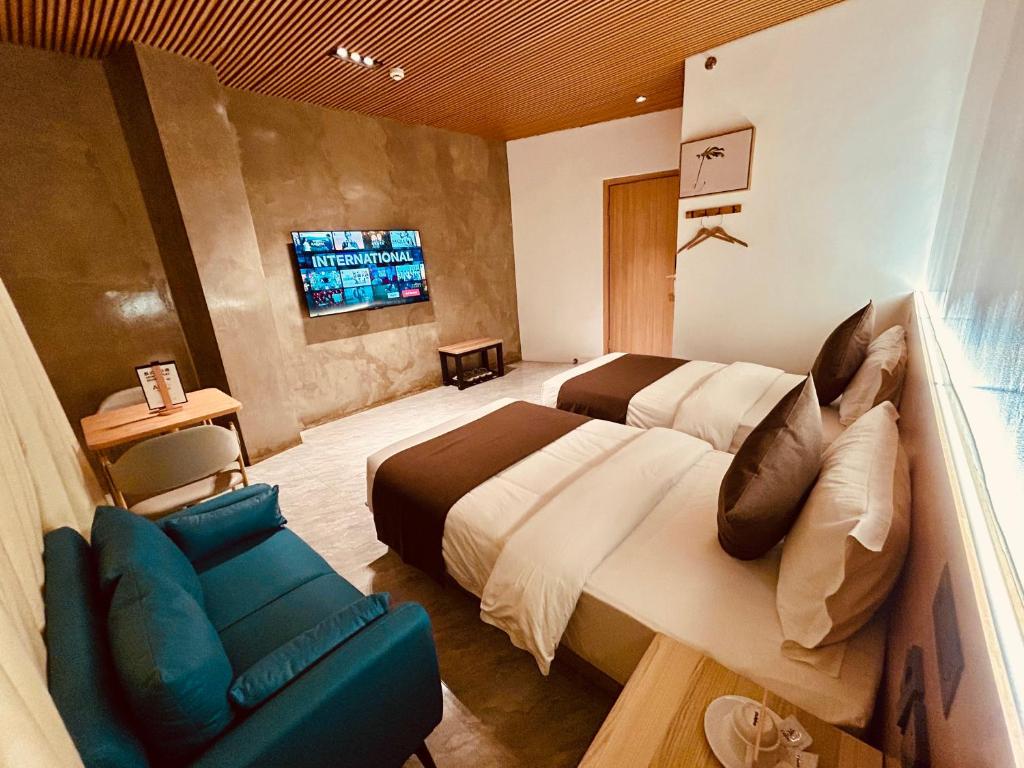 TV a/nebo společenská místnost v ubytování Terra Hotel Kawit
