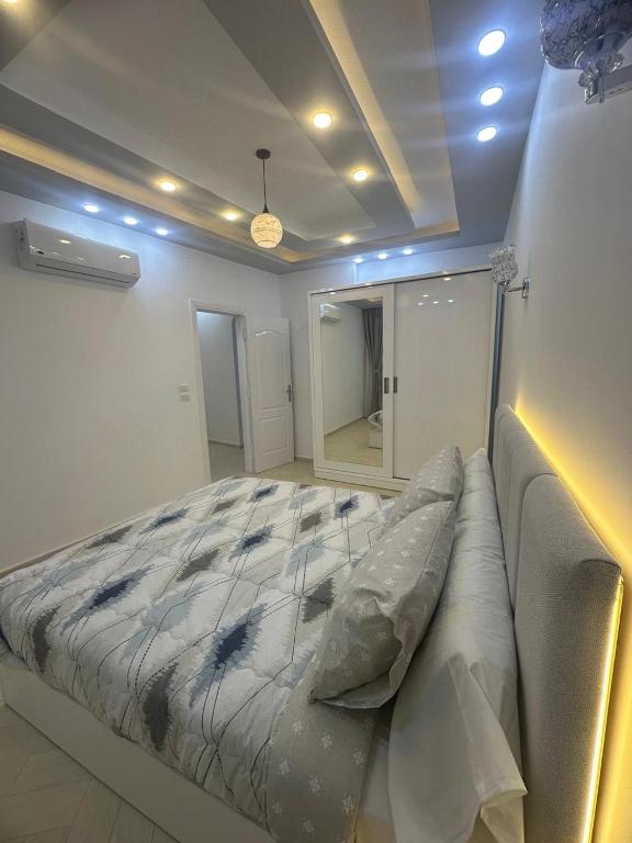 Postel nebo postele na pokoji v ubytování Al Saraya Sahl Hashish Serenity Chalet