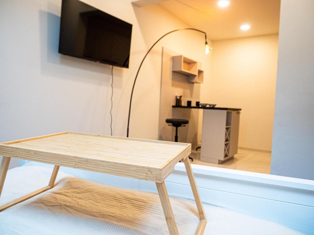 TV a/nebo společenská místnost v ubytování RM Appartements