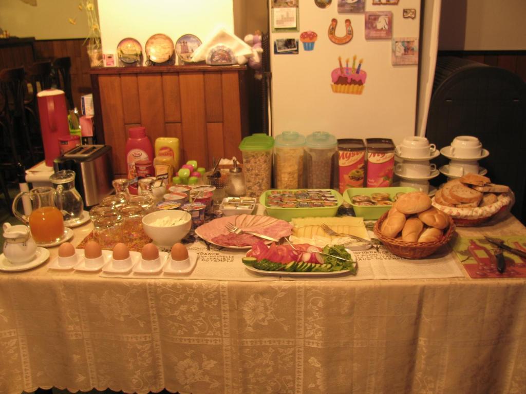 a table with food and other foods on it at Diamant in Karlovy Vary
