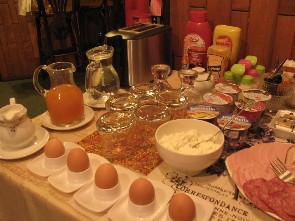 a table with eggs and other ingredients on it at Diamant in Karlovy Vary