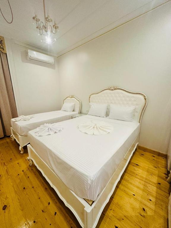 Postel nebo postele na pokoji v ubytování Atum