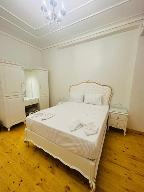 Postel nebo postele na pokoji v ubytování Atum