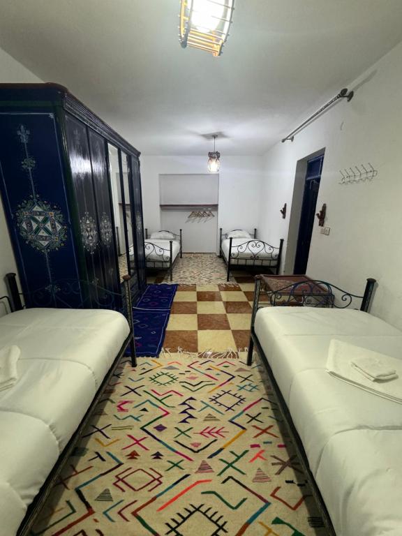 Cama o camas de una habitación en Bleu home