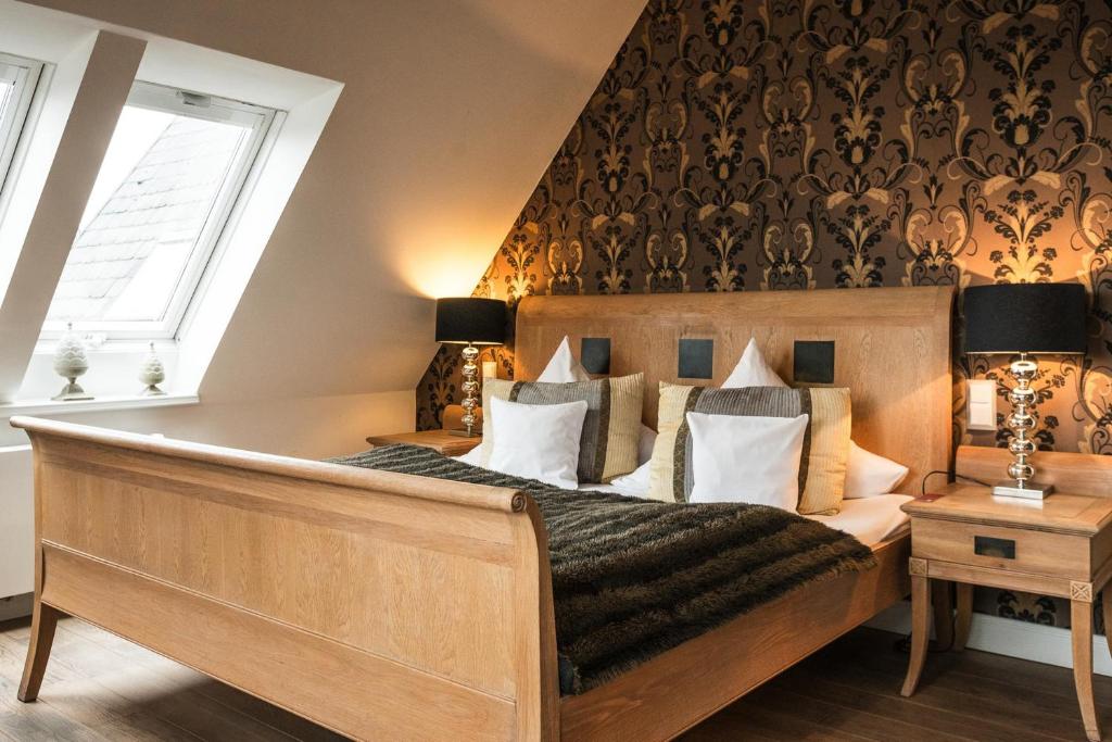 Postel nebo postele na pokoji v ubytování Boardinghouse Robbe