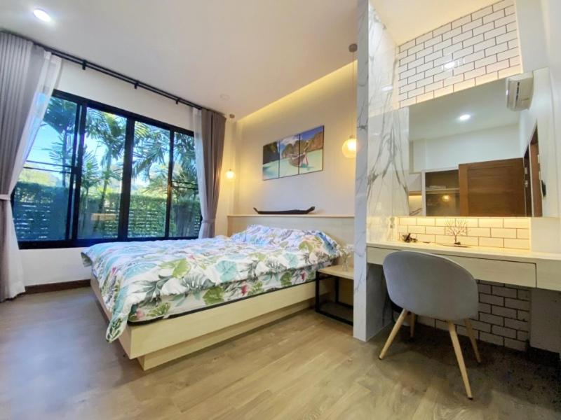 Letto o letti in una camera di Ploy Mountain View Pool Villa