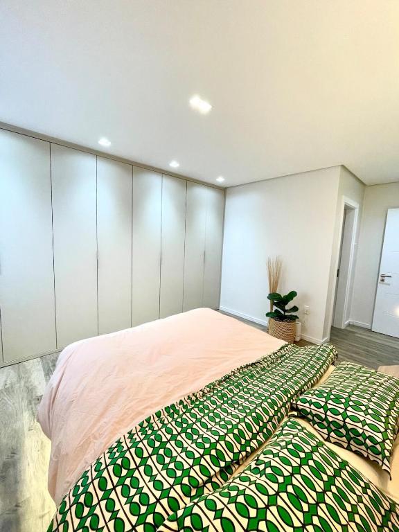 Postel nebo postele na pokoji v ubytování Cobertura Amanhecer em Dois Irmãos