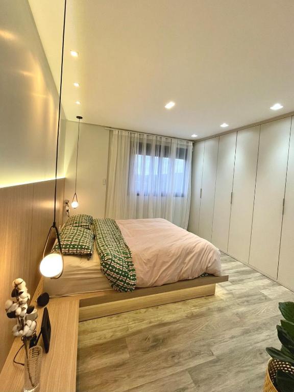 Postel nebo postele na pokoji v ubytování Cobertura Amanhecer em Dois Irmãos