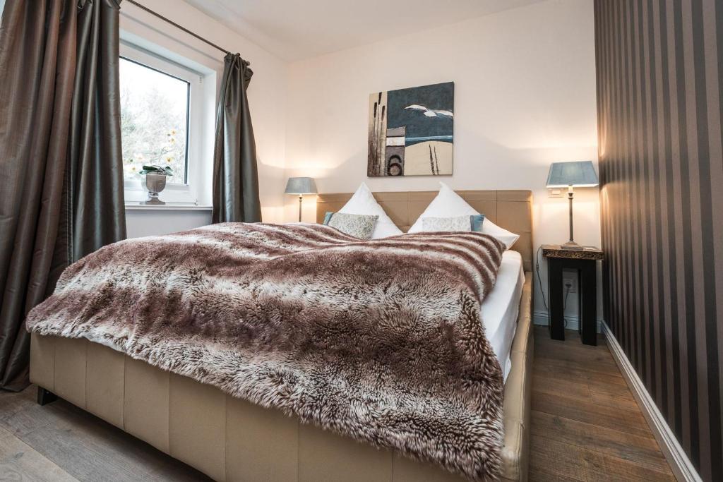 Postel nebo postele na pokoji v ubytování Boardinghouse Robbe