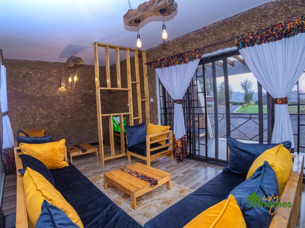 Postel nebo postele na pokoji v ubytování Ivy Homes - Kapchorwa