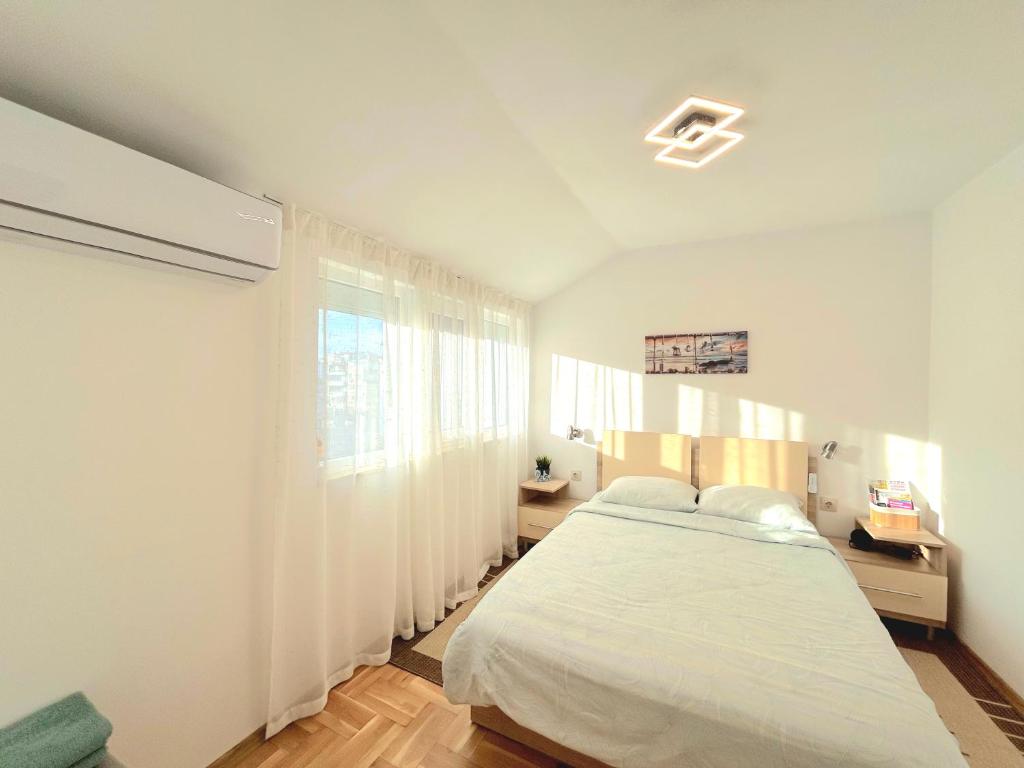 Ένα ή περισσότερα κρεβάτια σε δωμάτιο στο Centro apart