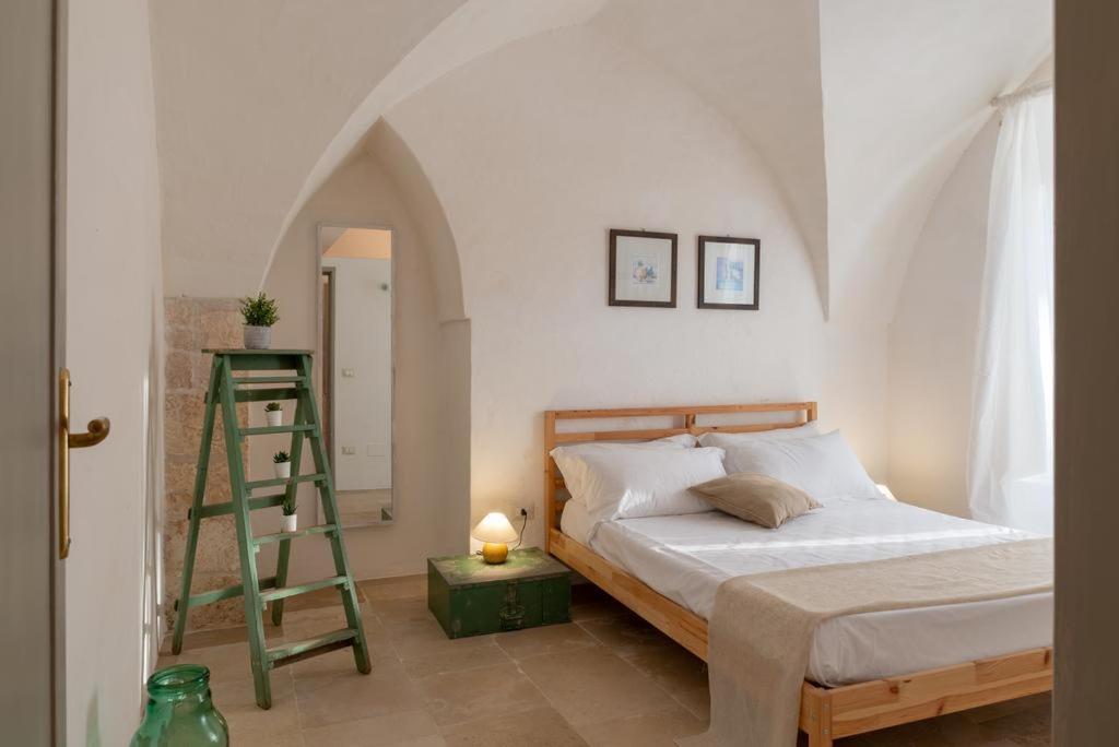 Postel nebo postele na pokoji v ubytování Masseria Pugliese Farm
