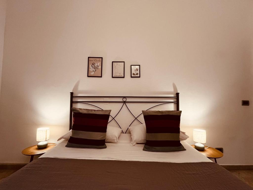Łóżko lub łóżka w pokoju w obiekcie Sicilia Vacation rooms