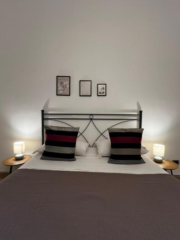 Łóżko lub łóżka w pokoju w obiekcie Sicilia Vacation rooms