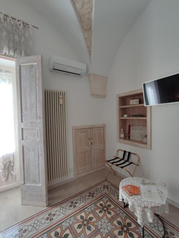 TV a/nebo společenská místnost v ubytování ROSSINI GUEST HOUSE