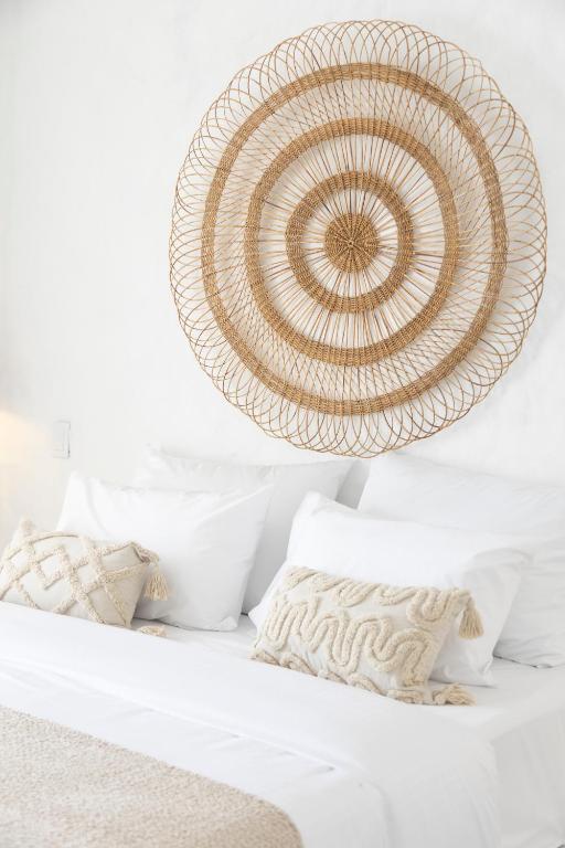 Postel nebo postele na pokoji v ubytování MYLOS Hotel Boutique