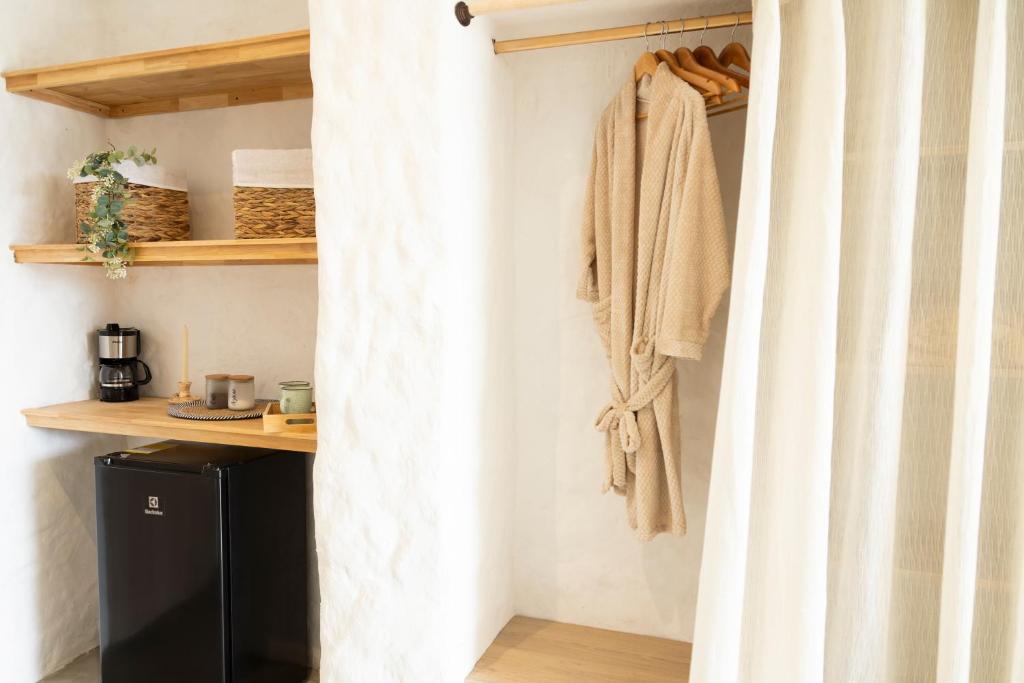 Kuchyň nebo kuchyňský kout v ubytování MYLOS Hotel Boutique