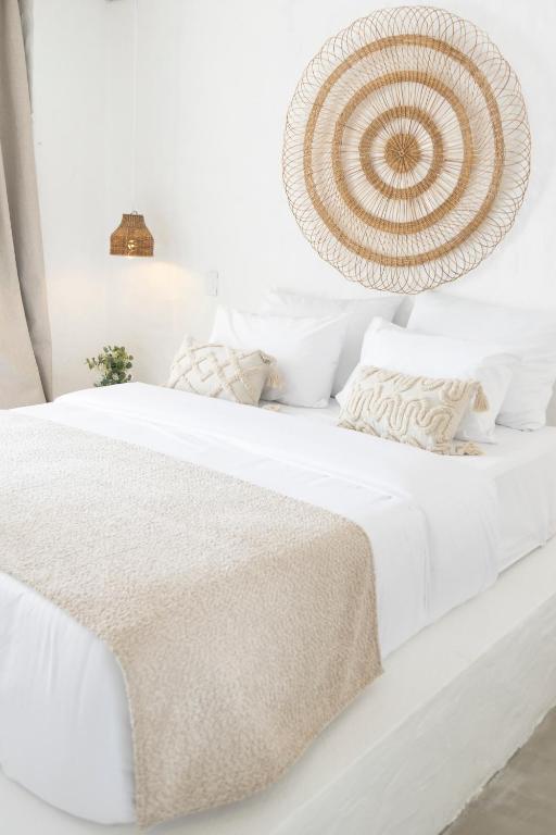 Postel nebo postele na pokoji v ubytování MYLOS Hotel Boutique