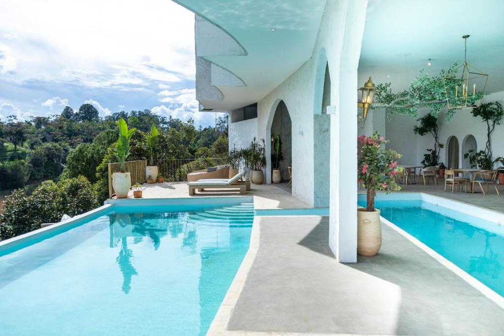 Bazén v ubytování MYLOS Hotel Boutique nebo v jeho okolí